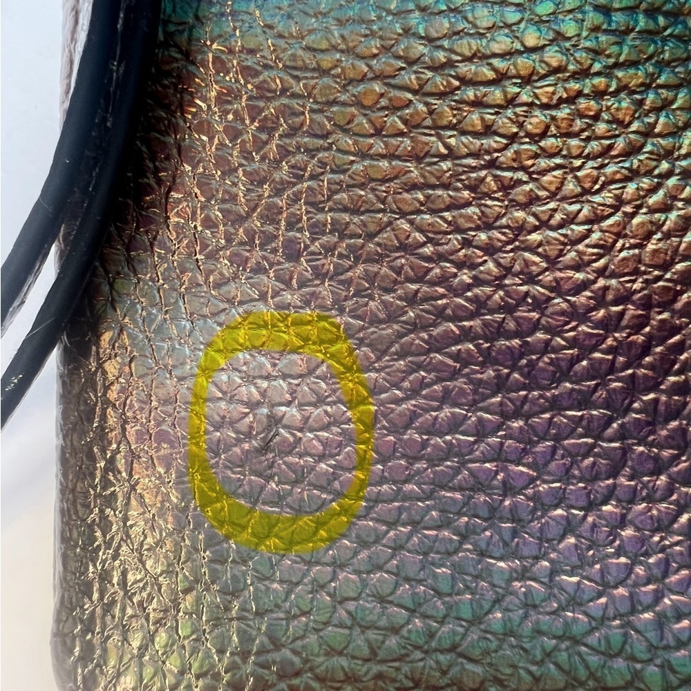 Juicy Couture Bronze iridescent Wristlet Clutch
Some wear - look closely - Picture 6 of 7
